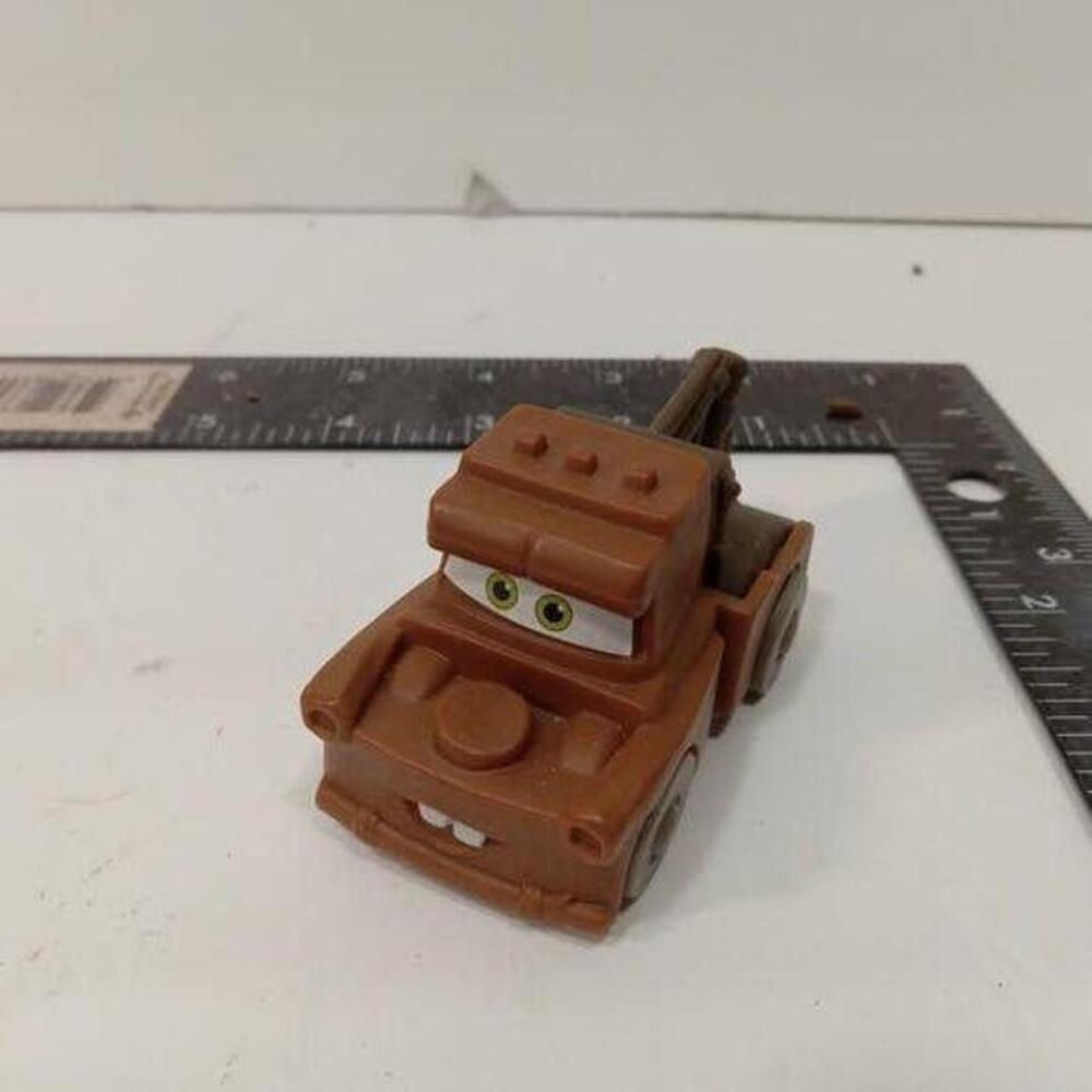 Brown plastic Mater toy from Disney Pixar Cars.